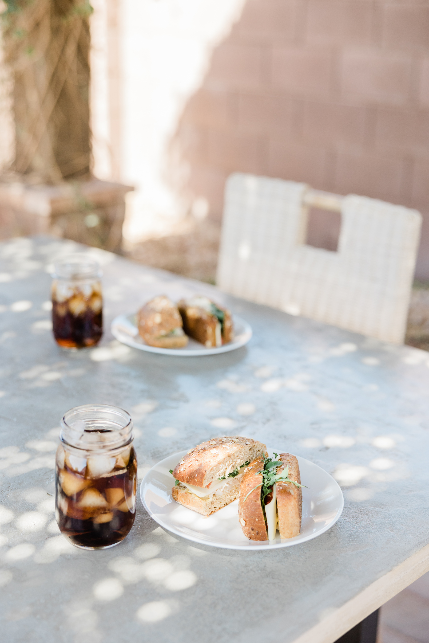 Sandwiches and Drinks on the Table Outdoors
